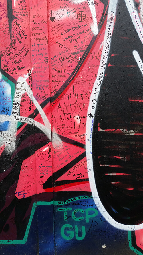 Examples of the murals and visitor messages on the Peace Walls
