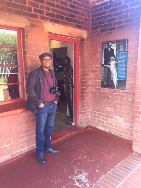 Moses Ochonu, History Department, in front of the Mandela Family House in Soweto.
